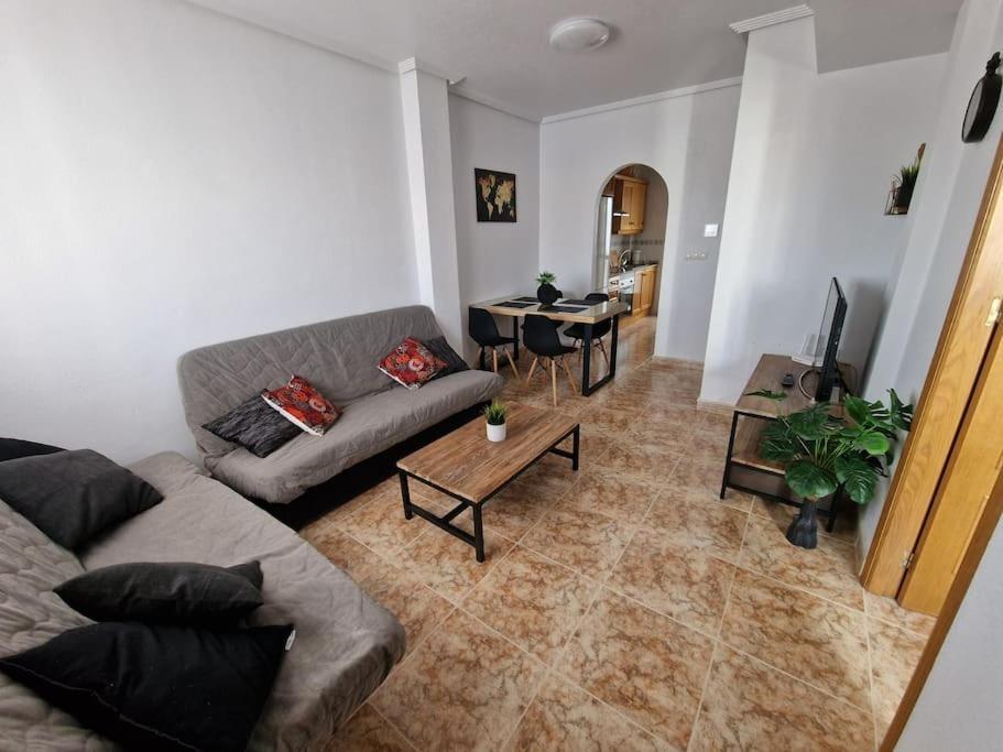 Appartement Punta Prima Flat With Private Roof Terrace