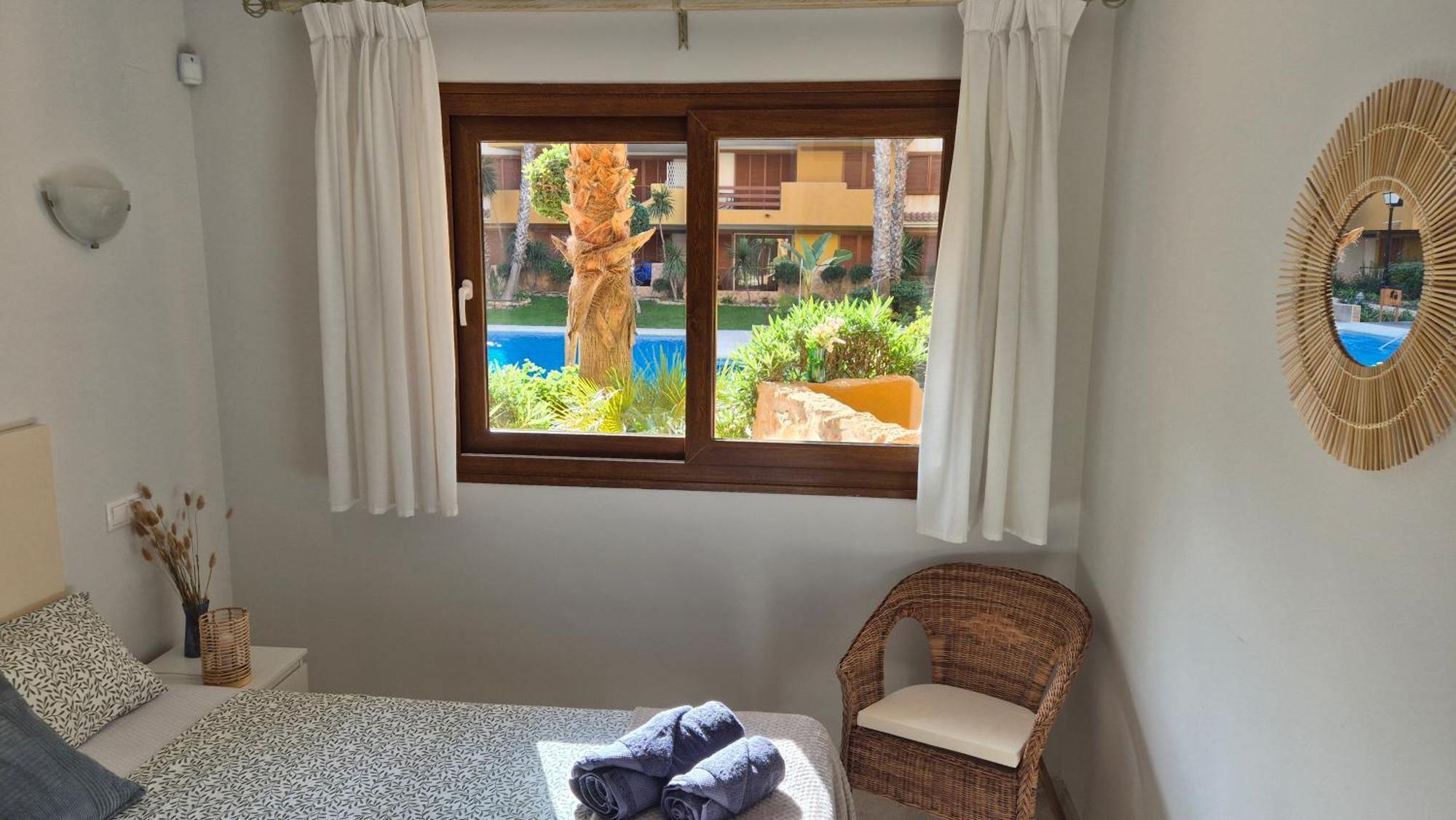 Apartment Ground Floor Punta Prima Looking At The Pool