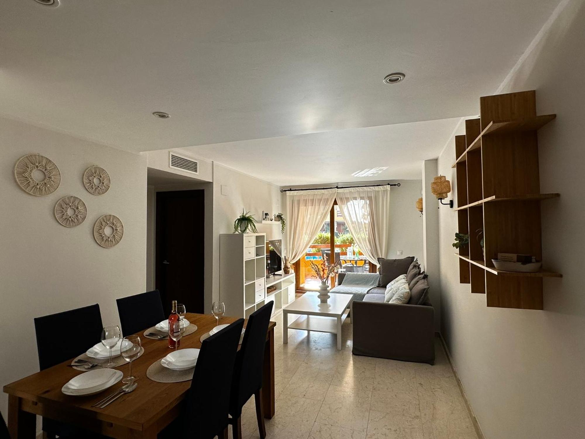 Apartment Ground Floor Punta Prima Looking At The Pool
